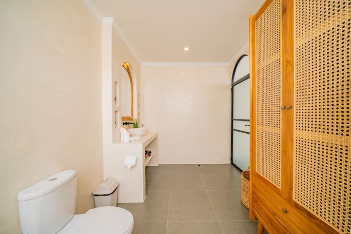 malea-Bathroom Rattan Door Arched Glass