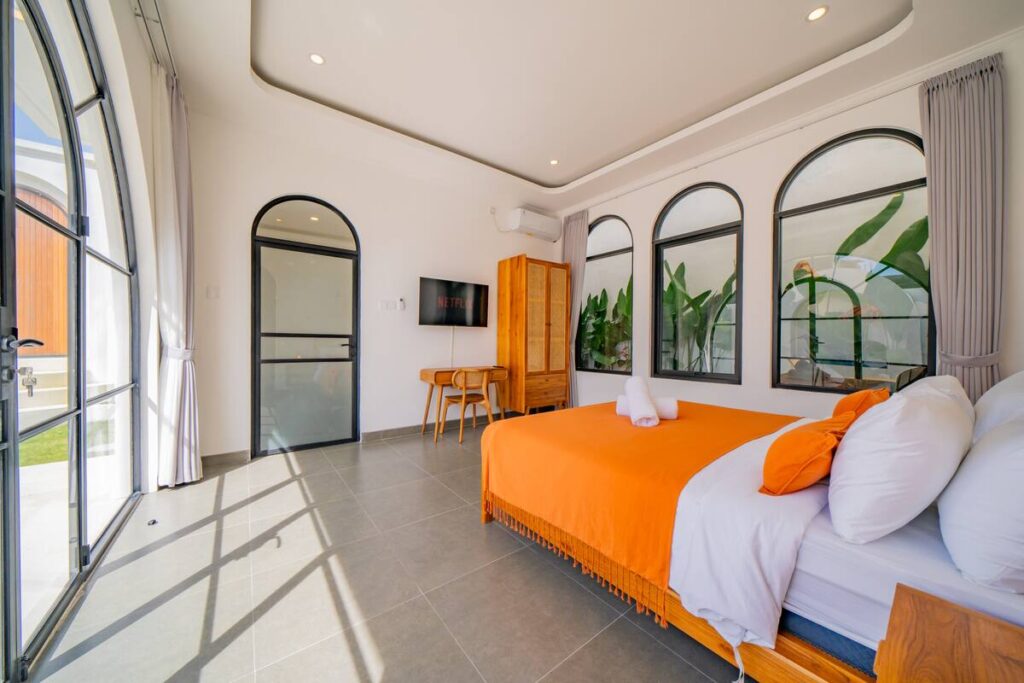 malea-Bedroom Arches Plants Orange Accents