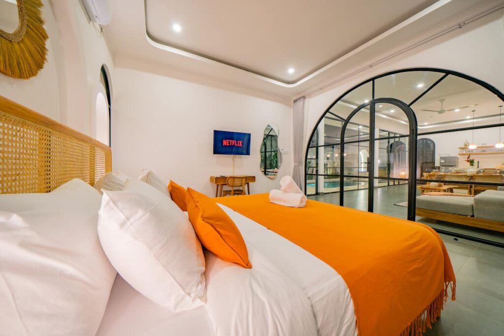 malea-Bedroom Orange Arches Pool View