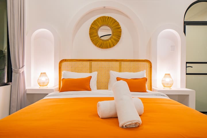 malea-Bedroom Orange Circle Wall Detail