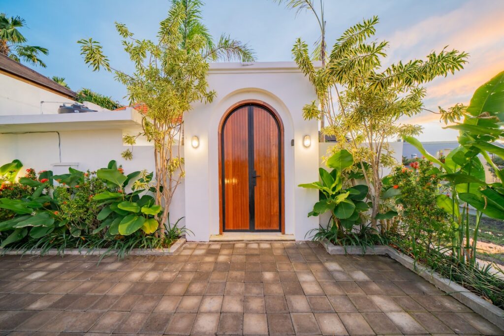 malea-Exterior Wood Door Palm Trees