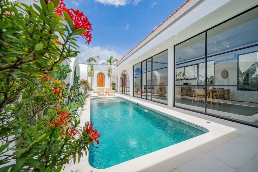 malea-Pool With Red Flowers