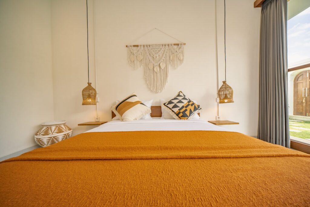swiss-Bedroom with orange bedding