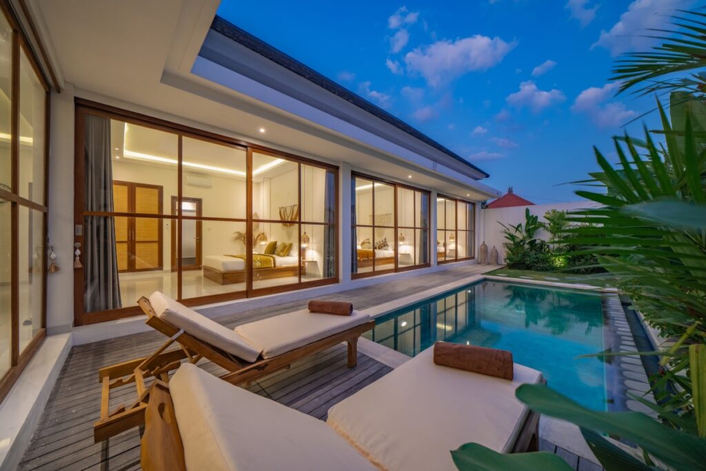 swiss-Villa sunset poolside view