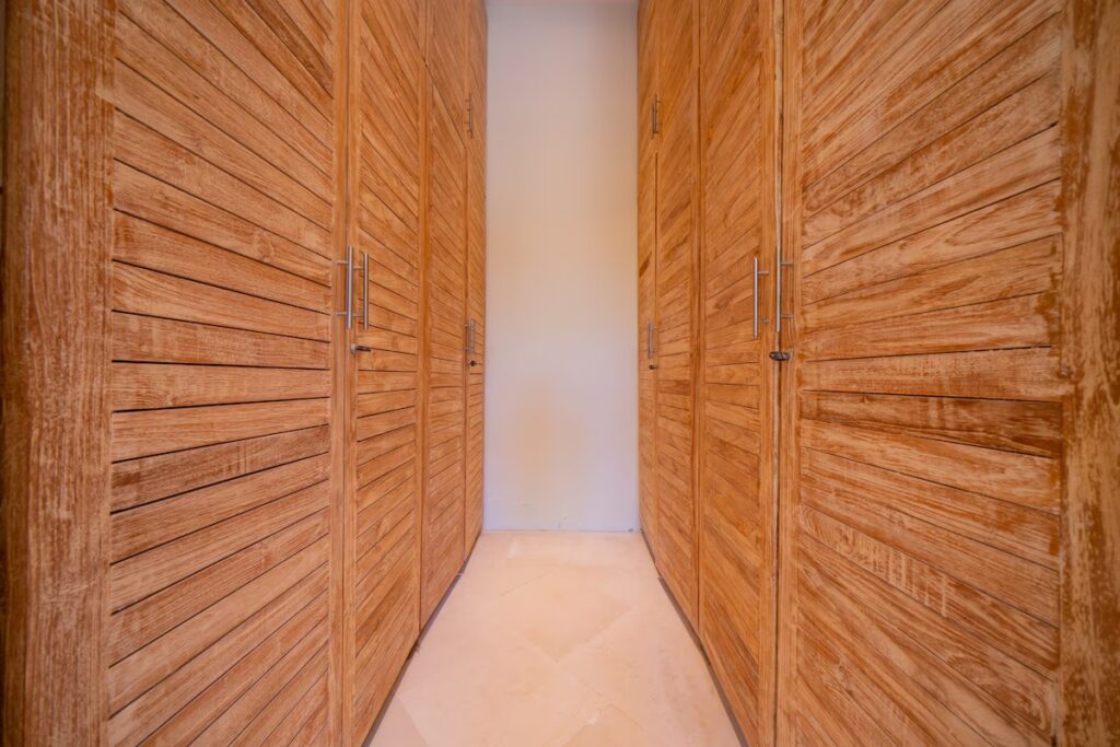 Spacious Walk-in Closet Wood Doors